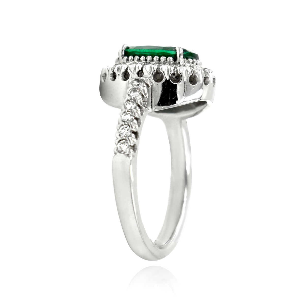 Ladies 14K White Gold Emerald and Diamond Halo Ring