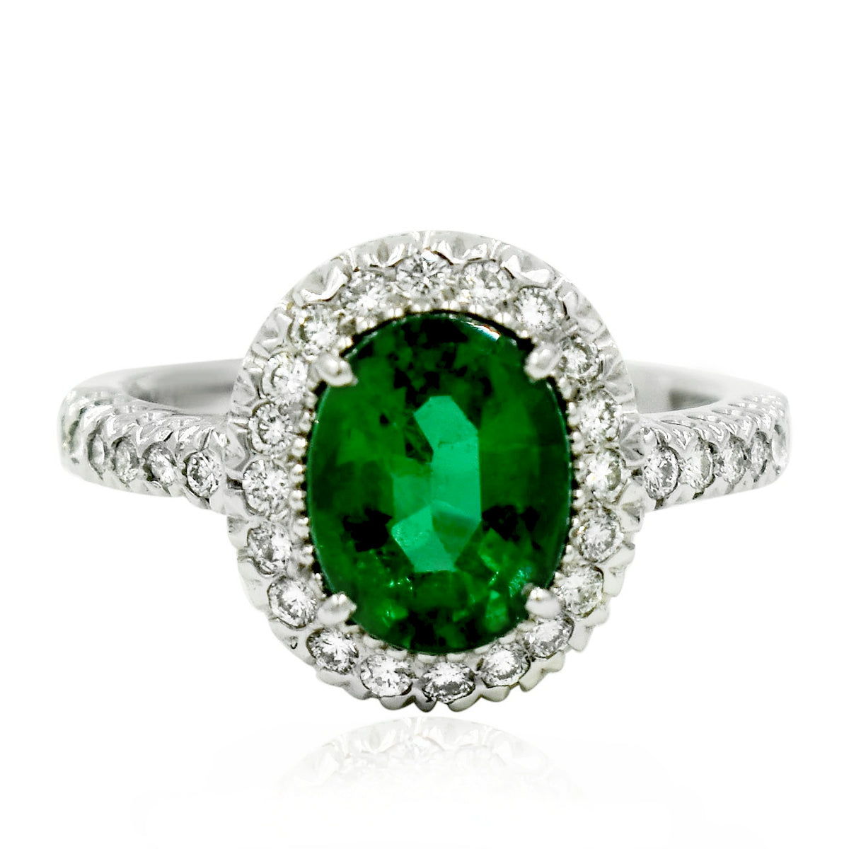 Ladies 14K White Gold Emerald and Diamond Halo Ring